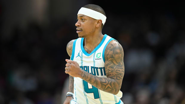 Thomas runs down the court for the Hornets.